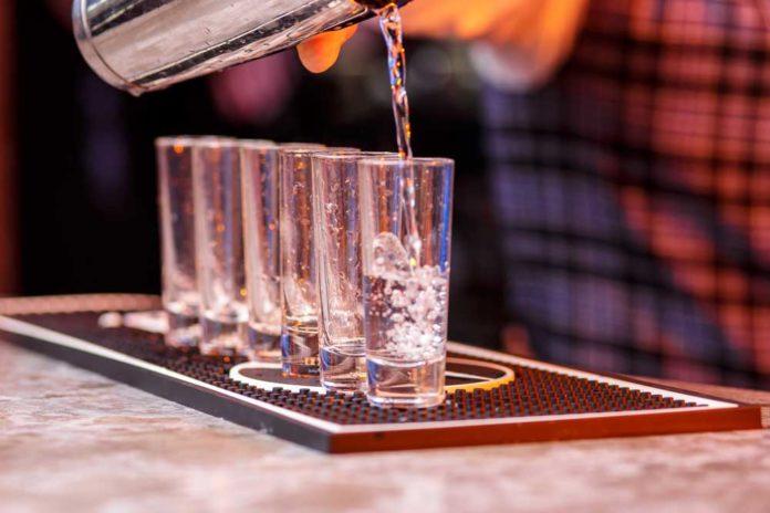 barman-at-work-preparing-cocktails-PVCV4YG-696x464.jpg